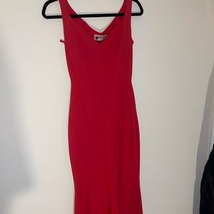 Worn once perfect condition very flattering and on beautiful material